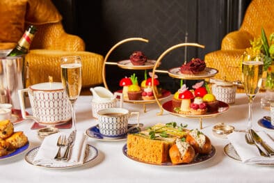 Traditional afternoon tea laid out in a spread for the London Storyteller